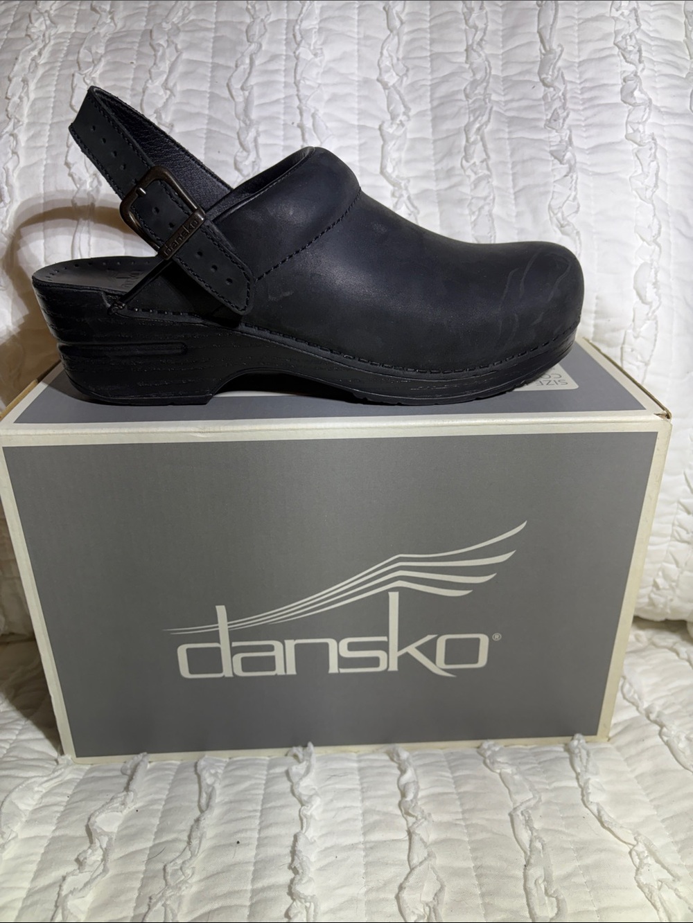 Dansko Black Leather Slip-On Clog with Slingback